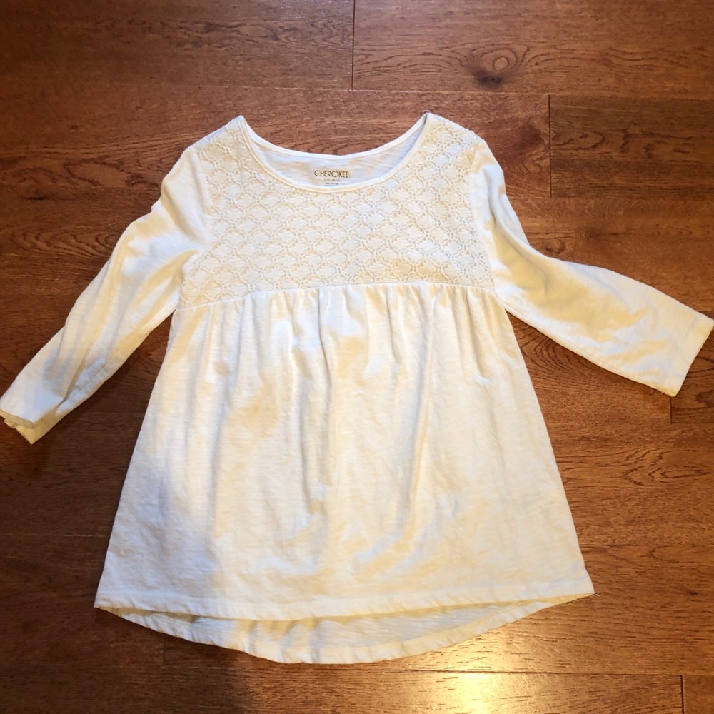 white long sleeved top